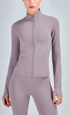 Sporty Long Sleeve Tops With Zipper Closure, Athleisure Half-zip Track Jacket, Casual Fitted Half-zip Track Jacket, Sporty Stretch Activewear With Zip Fly, Fitted Half-zip Outerwear, Winter Sports Tracksuit With Long Sleeves, Winter Sports Tracksuit, Fall Sports Activewear With Zipper Closure, Half-zip Sportswear Activewear With Zipper