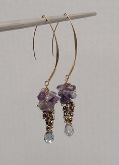 Leah's prosperity amethyst and crystal earrings Width: 2cm Height: 10cm Handmade Amethyst Drop Earrings, Gold Amethyst Drop Earrings, Amethyst Gemstone Crystal Earrings For Jewelry Making, Amethyst Crystal Earrings For Jewelry Making, Adjustable Gemstone Crystal Drop Earrings, Handmade Amethyst Teardrop Crystal Earrings, Spiritual Amethyst Drop Earrings, Purple Amethyst Spiritual Earrings, Lavender Amethyst Earrings With Natural Stones