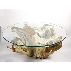 a glass table with wood pieces on it