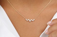 "Diamond Necklace / 14k Gold Necklace / Floating Diamonds Necklace / Diamond Bubble Pendant / Birthday Gift for Her / Christmas Gift Item Details * Made to Order. * Gold Kt: 14K * Custom Gold Color: Rose Gold, Yellow Gold, White Gold * Round Diamond: 1 pc 2.70 MM * Round Diamond: 2 pcs 2.40 MM * Round Diamond: 2 pcs 2.00 MM * Round Diamond: 2 pcs 1.50 MM * Total Number of Stones: 7 * Total CTW: 0.30 Ctw * Diamond Color Clarity: G Color Si1 Clarity * Setting Type: Bezel Setting * Ready to Ship in Dainty Diamond Pendant Necklace For Anniversary, Dainty Jewelry With Adjustable Chain For Birthday, Dainty Adjustable Chain Jewelry For Birthday, Elegant Diamond Jewelry For Birthday, Delicate Pendant Jewelry For Birthday, Anniversary Necklace With Delicate Round Cut Chain, Elegant Jewelry For Birthday, Fine Jewelry Pendant Necklace For Birthday, Elegant White Jewelry For Birthday