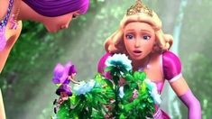 barbie the princess and the frog looking at each other in front of a flower pot