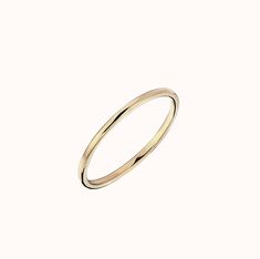 Our barely there stacking ring will have you saying “I woke up like this.” This piece offers a subtle statement alone, or is our first choice to pair with any of our more complex ring designs. Effortless, versatile, and always in style, this is a must have for any jewelry lover. Timeless Adjustable Stackable Rings For Everyday, Modern Stackable Rings For Everyday, Classic Stackable Engraved Ring For Everyday, Stackable 14k Gold Midi Rings With Thick Band, Stackable Thick Band Dome Ring For Everyday, Minimalist Adjustable Rings With Smooth Bezel, Modern Stackable Midi Rings For Everyday, Timeless Adjustable Stackable Midi Rings, Minimalist Promise Band