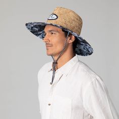 Choose the Mens Straw Lifeguard with Ocean Wave Under-brim, a stylish hat perfect for a day by the beach. Finessed from 100% straw with a 4.5" brim, featuring a unique wave print under-brim, damask woven wave patch, and a pinch crown. UPF 50+ sun protection ensures the safe wear of this fashionable, tropical lifeguard hat. Features: Color: BlueMaterials: 100% StrawBrim Size: 4.5" BrimSize: 59cmSun Protection: UPF 50+ Beachy Panama Hat With Uv Protection And Curved Brim, Casual Woven Brimmed Sun Hat, Upf 50+ Brimmed Panama Hat For Pool, Casual Woven Straw Hat With Curved Brim, Casual Brimmed Bucket Hat For Pool, Uv Protection Panama Hat With Curved Brim, Upf 50+ Short Brim Panama Hat For Pool, Casual Sun Hat With Upf 50+ For Pool, Short Brim Straw Hat With Uv Protection