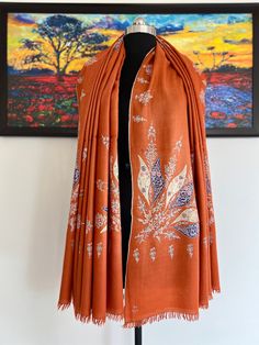 100% Handwoven Pashmina  and Hand embroidered Designer shawl Size: 100 x 200cm / 40 x 80 in / 1 x 2 meters Craft &Technique:Kashmiri sozni is among the elite legacy of Kashmir. Artisanal masterpieces are handcrafted by the Sozin kaars (needle workers), with a fine needle. The traditional motfis comprise paisley, iris, lotus, and saffron flowers, called badum in the local terminology. Nature always inspires these beautiful motifs, hence even cherries and grapes along with daffodils and marigolds Pashmina Shawl Embroidery Hands, Pashmina Shawl With Zari Work, Pashmina Shawl With Zari Work In Traditional Drape, Traditional Patterned Shawl For Eid, Embroidered Pashmina Shawl In Traditional Drape, Pashmina Shawl With Multicolor Embroidery In Traditional Drape, Winter Embroidered Shawl With Traditional Drape, Pashmina Scarves With Motifs In Traditional Drape, Traditional Pashmina Shawl With Traditional Patterns