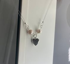 Heart Locket pendant choker necklace with adjustable silver chain. Locket opens and can hold a small photo. Adjustable Silver Chain Charm Necklaces, Heart Charm Choker Necklace As Gift, Heart Charm Choker Necklace For Gift, Adjustable Heart Pendant Locket Necklace, Adjustable Metal Charm Necklace With Heart Charm, Adjustable Metal Heart Pendant Charm Necklace, Heart Choker Necklace With Adjustable Chain As Gift, Heart Shaped Choker Necklace With Adjustable Chain For Gift, Adjustable Open Heart Necklace With Adjustable Chain