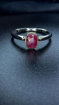 Elevate your jewelry collection with the vibrant allure of this Natural Ruby Ring, expertly crafted in 925 Sterling Silver. Featuring a stunning natural red ruby gemstone, this fashion jewelry piece captures the essence of passion and elegance. With a substantial weight of 2.46g, this gemstone ring is designed for those who appreciate both luxury and comfort, making it a standout addition to any ensemble. Features: Material: Premium 925 Sterling Silver, clearly marked for authenticity, offering White Gold Round Ruby Gemstones, Fine Jewelry Red Ruby Gemstones, Red Sterling Silver Rings With Prong Setting, Fine Jewelry Red Ruby Ring With Round Stone, Classic Ruby Jewelry With Round Stone, Red Ruby Round Band Jewelry, Red Ruby Ring With Round Stone Fine Jewelry, Classic Round Ruby Jewelry, Red Ruby Gemstones With Prong Setting