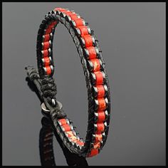 This handmade natural gemstone bracelet made with 2*4 mm roundel red variscite with 1*4 mm Hematite. It is a perfect gift for you and all your loved one for all special days. All our designs prepared by hand according to the your given sizes with love. Wrap is durable 1,5 mm polyester black rope. For closure of our high quality bracelet we used zamak alloys button with 2 optional closure buttonhole. We offer 8 size option between 5.9-8.7 inches (15-22 cm) , please DM us to demand different wrist size. Used Materials; 4*2 mm red variscite 4*1 mm hematite 1 cm zamak alloys button 1.5 mm black korean rope ☆ABOUT US☆ https://www.etsy.com/shop/SevenArtJewelry?ref=listing-shop2-all-items-count#about ☆OUR POLICIES☆ https://www.etsy.com/shop/sevenartjewelry#policies Thanks for your visit Seven Art Gift Red Coral Bracelet With Gemstone Beads, Adjustable Red Coral Jewelry, Adjustable Round Red Coral Jewelry, Adjustable Red Coral Beaded Bracelets As Gift, Handmade Adjustable Red Wrap Bracelet, Adjustable Red Handmade Wrap Bracelet, Red Wrap Bracelet With Round Beads, Red Adjustable Gemstone Beaded Bracelets, Adjustable Red Beaded Gemstone Bracelets