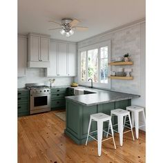 a kitchen with white cabinets and green island in the center is surrounded by three stools