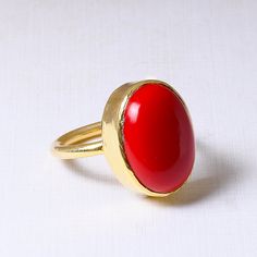 18K Gold Plated Ring, Red Coral Ring, Stacking Ring, Indian Artisan Ring, Bezel Set Ring, Oval Gemstone Ring, Women Fashion Ring Product Details Item Code: BJBR-2276 Stone Name: Synthetic Red Coral Stone Shape : Oval Stone Size : 12*17 mm Metal: 18K Yellow Gold Plated Over Brass Ring Sizes: Please choose from the drop-down menu. If you do not see your finger size, select custom and I'll make a ring just for you!  Shipping Info: All my items are safely and nicely packaged and shipped in a beautif Red Gemstone Ring For Gift, Adjustable Oval Red Ring, Adjustable Red Oval Ring, Red Oval Cabochon Ring, Red Oval Enamel Ring For Gift, Adjustable Red Oval Ruby Ring, Handmade Oval Dome Ring For Formal Occasions, Red Gemstone Dome Ring, Adjustable Oval Red Ruby Ring