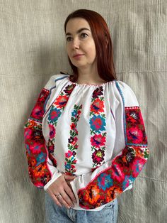 Very fashionable and unique Romanian embroidered blouse  ! Unbelievably stylish one in-spite of more than 70 years existence !  Very dense handmade embroidery , so it looks gorgeous and thrilling  Too Dominant and expressive floral  design  So interesting mix of  colours Great condition! Will suit to  S M  and little L size Folk Style Long Sleeve Embroidered Peasant Top, Folk Style Embroidered Hem Long Sleeve Peasant Top, Folk Style Long Sleeve Peasant Top With Embroidered Hem, Peasant Top With Multicolor Embroidery And Embroidered Hem, Multicolor Embroidered Peasant Top, Long Sleeve Blouse With Multicolor Embroidery, Folk Style Long Sleeve Top With Geometric Embroidery, Folk Style Long Sleeve Top With Embroidered Hem, Traditional Long Sleeve Shirt With Intricate Embroidery