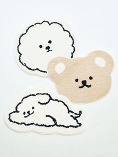 two patches with bears and clouds on them