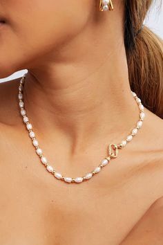 Picture yourself adorned in the delicate pearls of this beaded pearl necklace, exuding effortless charm and sophistication. Ideal for any occasion, from brunch with friends to a romantic evening out, these pearls add a touch of timeless beauty to your ensemble. Chic Pearl Necklace For Wedding, Elegant Pearl White Beaded Necklace With Pearl Pendant, Elegant Pearl White Beaded Chain Necklace, Elegant Pearl White Necklace With Beaded Chain, Elegant Pearl White Necklace With Pearl Pendant, Pearl Chain Necklace With Pearl Charm For Wedding, Dainty Beaded Necklaces With Pearl Pendant, Elegant Beaded Pearl Necklace As A Gift, Chic Pearl White Necklace For Wedding