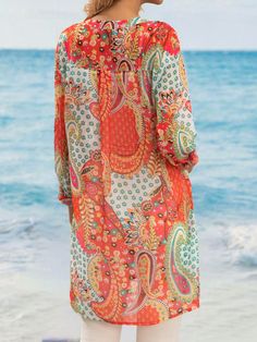 Printed V-neck Blouse For Beach Season, Multicolor V-neck Shirt For Beach, Multicolor Print Long Sleeve Tops For Vacation, Printed Long Sleeve Tops For Beach, Collared Patterned Tops For The Beach, Patterned Collared Tops For The Beach, Beach Button-up Top With Multicolor Print, Multicolor Print Button-up Top For Vacation, Long Sleeve Patterned Tops For Vacation