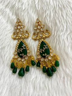 Sabyasachi inspired uncut Polki Kundan designer earrings. Gold plated. Semi precious stones and beads. Length 13cm If have any queries please ask. Chandbali Jhumkas For Designer Wear, Chandbali Jhumkas With Cutdana For Designer Wear, Chandbali Cutdana Jhumkas For Designer Wear, Festive Bollywood Jhumkas, Elegant Chandbalis With Cutdana For Designer Wear, Traditional Chandbali Jhumkas For Designer Wear, Bollywood Style Designer Earrings With Cutdana, Designer Kundan Earrings For Diwali, Bollywood Style Chandbali Earrings For Designer Wear