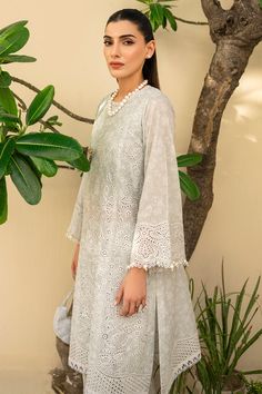 Brand: JAZMINProduct Code: IL-SS24-D2Collection: Iris by Jazmin Eid Lawn Unstitched Spring Summer CollectionFabric: Lawn DESIGN DETAILS: Digital Printed Embroidered Lawn Front Panel Digital Printed Embroidered Lawn Front Side Panels Embroidered Sleeves Borders Embroidered Front & Back Borders Digital Printed Embroidered Organza Dupatta Borders Embroidered Staple Dobby Net Dupatta Digital Printed Lawn Back & Sleeves Digital Printed Cambric Trouser DISCLAIMER:* Lining, Laces, and Tassels are not included in unstitched variants.* Embellishment items in stitched outfits are subject to market availability.* The actual colors of the outfit may vary from the colors being displayed on your device. CARE INSTRUCTIONS: Extra Fabric Has Been Used For Shoot Original Color May Vary Slightly From The Pic Lawn Design, Pakistani Designer Clothes, Embroidered Sleeves, Embroidered Organza, Luxury Wear, Basic Wear, Organza Dupatta, Net Dupatta, Pakistani Designers