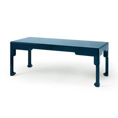 a blue table sitting on top of a white floor