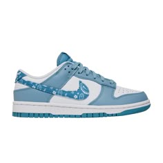 Find NIKE Wmns Dunk Low ' Paisley on Editorialist. The Nike women’s Dunk Low ‘Blue Paisley’ gives the classic silhouette a subtle makeover, highlighted by patterned detailing and a simple two-tone color scheme. Smooth white leather is utilized on the upper, contrasted by powder blue overlays at the forefoot and heel. Paisley print textile appears on the signature Swoosh and Nike-branded back tab. The low-top sits on a traditional rubber cupsole, featuring white sidewalls and a grippy blue rubber outsole. Jordan 1 Low Blue, Nike Dunks Low, Wmns Dunk Low, Nike Jordan 1 Low, Cute Casual Shoes, Nike Low Tops, Pretty Sneakers, Preppy Shoes, Jordan Shoes Retro