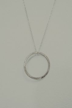 Looking for a highly wearable, minimalist pendant to add to your chain? Try the Small Open Circle Pendant! This style was designed to be an everyday staple. It’s simple, timeless and elegant — adorable with any necklace stack and easy to dress up for going out or wear it with jeans and a tee shirt. THIS LISTING IS FOR A SINGLE PENDANT.Each Small Circle Pendant measures approximately in 1” diameter.Available in 14K GOLD FILL, 14K ROSE GOLD FILL or STERLING SILVER To make this pendant we hand-form Elegant Full Circle Hammered Jewelry, Everyday Circular Cable Chain Necklace, Classic Jewelry With Round Pendant For Everyday, Classic Everyday Jewelry With Round Pendant, Minimalist Hammered Pendant Jewelry, Modern Hammered Sterling Silver Necklace, Circle Jewelry With Adjustable Chain For Everyday, Sterling Silver Round Pendant For Everyday, Sterling Silver Round Pendant Jewelry For Everyday