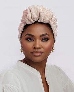 The Ruffle Turban is a beautiful and stylish headpiece that features exquisite ruffle detailing. Made from high-quality fabric, it offers both comfort and elegance. Its one-size-fits-all design and versatile styling options make it perfect for any occasion. Head Wrap Scarf, Head Wear, Wrap Scarf, Turbans, Head Wrap, Headpiece, Design