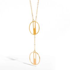 Art Deco-inspired adjustable lariat necklace featuring 2 small round pendants on a long, gold-filled cable chain. This 30" (72 cm) necklace does not have a clasp, as it is wide enough to fit around your head and can be adjusted to the desired position by gently sliding the pendants up or down.- Pendants: gold plated brass- Chain is 30" long (72 cm)- Chain: 14K gold filled or sterling silver- Dimensions: pendants measure approximately 0.8" x 0.8" (20 mm x 20mm) Modern Gold Lariat Necklace, Modern Gold Metal Lariat Necklace, Minimalist Long Necklace As A Gift, Modern Gold Lariat Necklace With Adjustable Chain, Minimalist Adjustable Long Necklace As Gift, Minimalist Adjustable Long Necklace For Gift, Modern Gold Charm Necklace, Rose Gold Lariat Necklace With Adjustable Chain, Lariat Necklace With Round Pendant For Gift