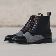 A modern twist on a classic military style. Stay sharp with this unique twist on our jumper boot. Features: Light Grey Flannel vamp and back Box Calf Black Zurigo traditional rounded toe Orange Leather Lining Old Silver Metal Grey Laces Black Outsole Leather Orange Sole Handcrafted with Passion Goodyear Welt Construction Can be Resoled Fitted Moto Boots For Winter Workwear, Fall Lace-up Boots With Rubber Sole For Derby, Fitted Cap Toe Lace-up Boots For Fall, Fitted Combat Boots With Reinforced Heel For Fall, Fitted Moto Boots With Leather Sole For Fall, Cap Toe Boots For Winter Workwear, Goodyear Welted Combat Boots With Round Toe For Winter, Formal Cap Toe Winter Boots, Formal Winter Lace-up Boots With Rubber Sole