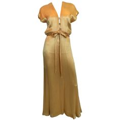 Hollys Harp 1970's Gold Silk Evening Gown Size label: S Measurements taken flat: Shoulders: 24.5" Armpit to armpit: 17.5" Bust: 17.5" Waist: 13" Hips: 20" Length - Front: 45.5" Back: 58" Good Vintage Condition:Please remember all clothes are previously owned and gently worn unless otherwise noted. ALL SALES FINAL. No refunds or exchanges. Gold Ball Gown, High Neck Halter Dress, Uzun Boy, Chic Closet, Vintage Ball Gowns, Silk Evening Gown, Gold Evening Dresses, Velvet Dress Long, Gold Cocktail Dress