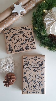 some wrapping paper and christmas decorations on a table