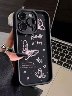 a person holding up an iphone case with pink butterflies on it and the words, i love you