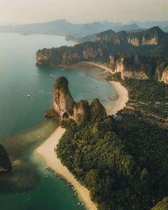 an aerial view of the beach and mountains in halo bay, malaysia photo by shutterstocker / getty images