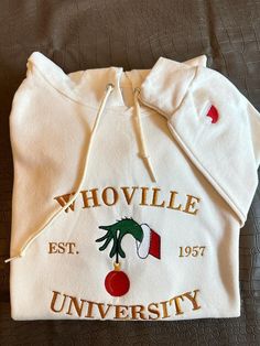 Christmas Hoodie, Christmas Whoville University Embroidered Hoodie, Christmas Gift, Christmas Embroidery Hoodie, Christmas Crewneck 90% cotton, 10% polyester * Unisex Hoodies fits men & women great. * All sizes are available in the following (S, M, L, XL, 2X, 3X) If needed larger or smaller please send us a quick email to get it in stock for you. * Your custom Artwork/LOGO is digitally digitized and embroidered with best in class embroidery machines. * THE PERFECT GIFT: Many of our designs make Christmas Whoville, Whoville University, Embroidery Hoodie, Christmas Crewneck, Embroidery Gifts, Christmas Hoodie, Christmas Hoodies, Style Hoodie, Soft Hoodie