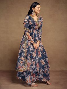 Introducing the stunning "attractive blue floral printed chiffon festival wear palazzo suit" from Ethnic Plus, a must-have addition to your ethnic wear collection. Made from high-quality chiffon material, this suit features intricate floral print, zari work, and sequin work, making it the perfect outfit for festivals, weddings, and other special occasions. The set includes a fully stitched blue palazzo suit with a matching chiffon palazzo and dupatta, all adorned with beautiful floral prints and Bohemian Blue Palazzo Set With Printed Motifs, Blue Bohemian Sharara With Floral Print, Anarkali Style Semi-stitched Floral Sharara, Multicolor Palazzo Set In Georgette With Digital Print, Multicolor Georgette Palazzo Set With Digital Print, Multicolor Digital Print Georgette Palazzo Set, Blue Floral Print Sharara For Eid, Bollywood Style Floral Print Sharara For Eid, Bohemian Semi-stitched Printed Sharara