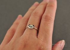 Panda: one of our favorite, it is super cute and adorable. This little Panda ring will made you happy everyday. Model is wearing a size 5. --- S I Z E Panda: About 8mm (W) Ring Wire: 17 Gauge F I N I S H Brushed or Polished/Shiny M A T E R I A L 925 sterling silver --- Note: Brushed finish by time of wearing will become naturally shine. Cute Adjustable Midi Promise Rings, Cute Adjustable Ring For Everyday, Cute Adjustable Everyday Rings, Cute Small Ring As Gift, Cute Tiny Rings For Gifts, Cute Everyday Jewelry Ring, Cute Small Everyday Jewelry, Cute Everyday Ring, Cute Silver Rings For Birthday