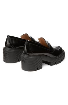 A lug sole and chunky heel add bold style to this otherwise classically styled loafer made for complementing both workwear and casual styles. 2 1/2" heel; 1 1/4" platform (size 8.5) Leather upper and lining/synthetic sole Made in Spain Loafer Women, Casual Styles, Bold Style, Lug Sole, Chunky Heel, Bold Fashion, Loafers For Women, Chunky Heels, Stuart Weitzman