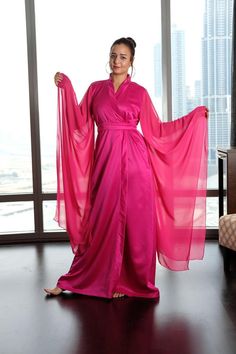 Pink Elegant Robe wide sleeve Elegant Satin V-neck Kimono, Evening Kimono With Satin Finish And Kimono Sleeves, Evening Kimono With Satin Finish, V-neck Satin Kimono For Party, Satin Robe With Kimono Sleeves For Evening, Evening Satin Robe With Kimono Sleeves, Elegant Floor-length Satin Kimono, Elegant Pink V-neck Kimono, Elegant V-neck Robe For Evening