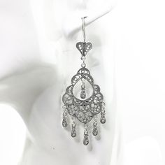 Handmade 925 Sterling Silver Artisan Crafted Filigree Chandelier Earrings  Material: 925 Solid Sterling Silver, 925 Stamped Earrings Length: 2.75 inches Earrings Width: 1 inch Closure: Ear wire with safety catch Finishing: Oxidized and Polished Comes with a gift pouch and box. Free Domestic Shipping We hope that you enjoy our exclusive artisan handcrafted jewelry. Filigree Dangle Bridal Earrings As Gift, Intricate Design Bridal Earrings, Silver Elegant Chandelier Earrings As Gift, Elegant Silver Chandelier Earrings As Gift, Elegant Silver Chandelier Earrings For Gift, Ornate Sterling Silver Chandelier Earrings As Gift, Handmade Silver Chandelier Earrings For Anniversary, Traditional Sterling Silver Chandelier Earrings For Wedding, Traditional Silver Chandelier Earrings For Anniversary