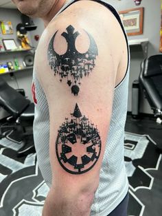 a man with a star wars tattoo on his arm