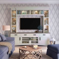 a living room filled with furniture and a flat screen tv mounted on a wall above a wooden coffee table