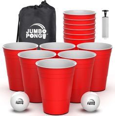 red plastic cups and white balls are in front of a black bag with the jumbo pong logo on it