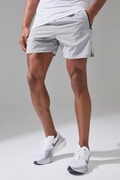 A gym essential you need gym shorts are an essential in your everyday wardrobe, especially in your fitness and casual wear. These shorts are not just about comfort and ease, they are designed for the active lifestyle, whether you're hitting the gym or going for a run with your mates. Our range includes a variety of styles, such as leggings shorts for optimal performance, lightweight running shorts for agility, and stylish, relaxed-fit shorts for everyday wear. The colour palette ranges from classic neutrals to bold shades making it easy to team up with your favourite gym tee and sneakers. Gym Shorts Men, New Outfit Ideas, Mens Workout Shorts, Mens Gym Shorts, Gym Jacket, Plus Size Joggers, Gym Outfit Men, Gym Tees, Suits Prom