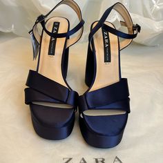 New With Tag Chunky High Heel Platform Sandals. Satin Effect Fabric With Contrast Navy Blue Color. Front Strap. Buckle Closure At Ankle. Heel Height: 5.1 Inches (13 Cm) Tag Size Eu39/Us8 Airfit. Flexible Technical Sole Made Of Latex Foam Designed To Offer Increased Comfort. S77 Dark Blue Heels Wedding, Shoes For A Navy Blue Dress, Midnight Blue Heels, Chic Evening Wedge Sandals With Block Heel, Chic Block Heel Wedge Sandals For Party, Elegant Block Heel Wedge Sandals For Party, Elegant Party Wedge Sandals With Block Heel, Blue Round Toe Wedge Sandals For Formal Occasions, Blue Sandals With Heel Strap For Party