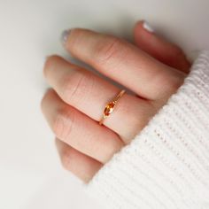 14k Gold Citrine Ring, 14k Gold Dainty Marquise Citrine Ring, 14k Gold Minimalist Citrine Ring, Stacking Citrine Ring Marquise Citrine Ring ✦ Product Features: ● Made to order ● Materials: Solid Gold ● Gold Kt: 9K, 10K, 14K, 18K  ● Gold color: Rose Gold, White Gold, and Yellow Gold ● Setting: Natural Citrine ● Total number of stones: 1 ● Total Citrine ctw: 0.20 ctw  ● Band width: 1.10mm ● Ready to ship: 7-10 business working days (excluding weekends) ✦ Gemstone Certificate: ● Absolutely, if you wish to have a gemstone certificate, we are happy to provide it for you. There will be an additional certificate fee of USD 30 to get the gemstone certificate report. The gemstone certificate issuance is an International Gemstone Association Laboratory (IGA).    ✦ Customiszation: ● We would really l Orange Birthstone Jewelry For Anniversary, Fine Jewelry Orange Diamond Ring As Gift, Orange Diamond Ring For Gift, Fine Jewelry, Orange Diamond Ring Fine Jewelry For Gift, Fine Jewelry Orange Diamond Ring For Gift, Orange Diamond Ring For Gift, Citrine Birthstone Ring With Gemstone For Promise, Promise Ring With Citrine Birthstone, Citrine Gemstone Birthstone Ring For Promise