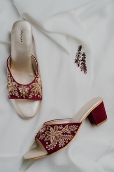 A beautiful and comfortable friend for your feet . The hand embroidered zardozi art is the perfect heels for you this wedding season. The insoles are made of soft foam to give you all day comfort. We can customise the heel as per your choice. Material : Velvet Heel in the picture: 2 inch block heel OutSole : Non slip TPR Color : Burgundy Embroidered Low Heel Wedding Shoes, Red Block Heel Wedding Heels, Festive Round Toe Heels For Party, Formal Open Toe Heels For Festive Occasions, Formal Festive Open Toe Heels, Festive Summer Heels High Heel, Festive Open Toe Wedding Shoes, Festive Elegant High Heel Shoes, Traditional Open Toe Heels For Party