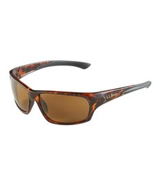 With classic sport wrap styling, these sunglasses provide a generous field of vision and comprehensive protection. The lightweight frame and lenses won't weigh you down on your outdoor adventures. G850 nylon frame contains 45% plant-based material. Injection polycarbonate polarized lens are durable and scratch resistant. Non-slip dual injection rubber on temples and nose gives a comfortable no slip, no bounce fit. Class 1 optics offer excellent optical clarity. Polarized lenses remove glare on t Brown Sports Sunglasses With Uv Protection, Brown Sports Sunglasses With Gradient Lenses, Brown Anti-reflective Sunglasses For Outdoor Activities, Brown Shield Sunglasses With Gradient Lenses For Outdoor, Brown Sunglasses With Uv Protection For Outdoor, Brown Polycarbonate Shield Sunglasses For Outdoor, Brown Polarized Shield Sunglasses For Outdoor, Brown Anti-reflective Sunglasses For Outdoors, Outdoor Brown Shield Sunglasses With Polarized Lenses