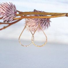 These earrings are simple, stylish, lightweight and perfect for everyday. Medium sized teardrop hoops dangle simply from French style ear wires, all hand formed and hammered by me in the metal of your choice.  These hoops come in both a smooth finish and a hammered / textured finish to fit any style, and while light weight are made with sturdy metal so they're solid and won't wobble or bend easily.  Throw these on to add a touch of style to anything you wear. Try wearing your hair in boho braids Delicate Teardrop Hoop Earrings For Gift, Delicate Teardrop Hoop Earrings As Gift, Delicate Teardrop Hoop Earrings, Elegant Everyday Hoop Teardrop Earrings, Everyday Hammered Rose Gold Earrings, Elegant Everyday Teardrop Hoop Earrings, Dainty Hypoallergenic Teardrop Earrings For Everyday, Everyday Elegant Teardrop Earrings, Everyday Rose Gold Hammered Earrings