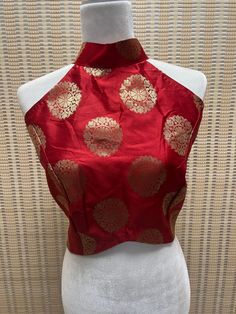 *Halter neck Red blouse brocade design  *Saree/Choli Blouse *Stitched/Readymade Size: *Please message us for size customization options!  *Color May Vary Slightly From Picture  *Our store is located in Los Angeles Festive Raw Silk Sleeveless Traditional Wear, Sleeveless Raw Silk Traditional Wear For Festive Occasions, Festive Sleeveless Raw Silk Traditional Wear, Festive Traditional Drape Top For Wedding, Festive Cutdana Tops With Traditional Drape, Halter Neck Blouse With Sleeves, Red Art Silk Blouse For Diwali, Fitted Festive Traditional Wear With Motifs, Red Blouse With Zari Weaving For Festivals