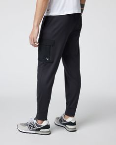 Our best-selling joggers get reinvented with added function on the Sunday Utility Jogger. This version of our classic bottoms features woven cargo pockets on the same 88% recycled performance stretch fabric you already love. | Vuori Sunday Utility Jogger Pants | Black | XL Vuori makes premium performance apparel inspired by the active Coastal California lifestyle; an integration of fitness, surf, sport, and art. Breaking down the boundaries of traditional activewear, we are a new perspective on 4-way Stretch Sportswear Joggers With Side Pockets, Techwear Joggers With Side Pockets For Jogging, Casual Joggers With Functional Pockets For Jogging, Urban Style Cargo Pants For Jogging, Functional Tapered Leg Activewear With Side Pockets, Casual Jogging Bottoms With Functional Pockets, Casual Jogging Pants With Functional Pockets, Functional Joggers With Comfort Waistband And Tapered Leg, Midweight Athleisure Bottoms With Functional Pockets