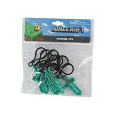 some green and black beads are in a package on a white background with the words minecraft