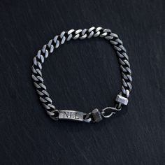 A personalized bracelet for men with an ID bar, that can be engraved, in oxidized sterling silver on curb chain and a unique handmade hook at closure. This custom men jewelry is 100% made by hand and it is an excellent choice for a birthday gift for him. D E T A I L S * Metal: High Quality Sterling Silver 925 * Finish: Black Oxidized * Curb Chain 7mm * Tag Dimensions: 20mm x 8mm * Length: 7.5 inches - 9 inches * You can personalize it if you want to 100% nickel free. Delivered in an elegant gift Christmas Gift For Him, Personalized Bracelet, Christmas Gifts For Him, Men's Bracelet, Jewelry Christmas, Men Jewelry, Gift Package, Fedex Express, Birthday Gift For Him