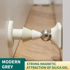 an image of a door handle with the word magnetic suction since door shut on it