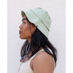 Introducing our versatile and nifty bucket hat, designed to keep you cool and protected. Made with a breathable fabric, this hat is the perfect companion for warm weather adventures. Its traditional brim gives sun protection, shielding you from harmful UV rays while adding a touch of style to your outdoor looks. The pull cord keeps your hat secure while adventuring, park lounging, or outdoor brunching. Available in 3 summer perfect colors for all ages and genders. Your ultimate companion for out Trendy Lightweight Adjustable Bucket Hat, Lightweight Adjustable Fit Summer Bucket Hat, Lightweight Spring Bucket Hat For Outdoor, Adjustable Cotton Bucket Hat With Uv Protection, Solid Color Visor Bucket Hat For Outdoor Activities, Visor Bucket Hat For Outdoor Activities, Lightweight Bucket Hat For Outdoor, Lightweight Curved Brim Bucket Hat For Outdoor, Lightweight Visor Bucket Hat For Outdoor